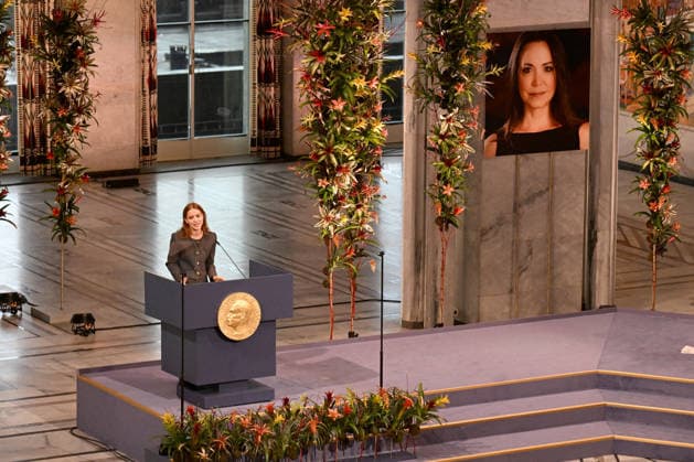 Venezuelan politician Marina Corina Machado s daughter Ana Corina Sosa Machado picks up the Nobel Peace Prize on her behalf at The Nobel Peace Prize Ceremony at Oslo City Hall on December 10, 2025 in Oslo, Norway  OSL202510201 PAULxTREADWAY