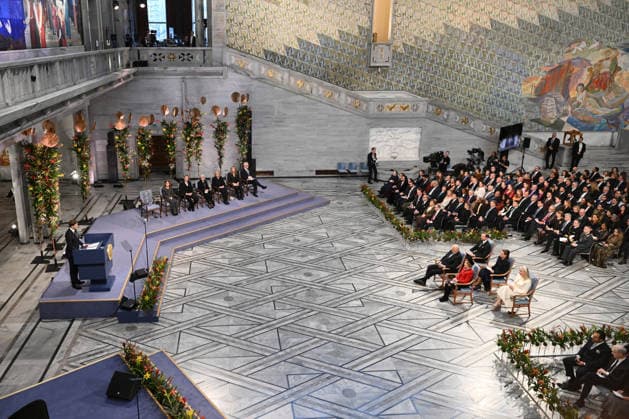 Jorgen Watne Frydnes, chair of the Norwegian Nobel Committee, Ana Corina Sosa Machado, daughter of Venezuelan opposition leader Maria Corina Machado, King Harald V of Norway, Magnus Haakon, the Crown Prince of Norway, Queen Sonja of Norway, Princess Ingrid Alexandra of Norway and Crown Princess Mette-Marit of Norway attend the 2025 Nobel Peace Prize presentation ceremony at Oslo City Hall on December 10, 2025 in Oslo, Norway OSL202510228 PAULxTREADWAY