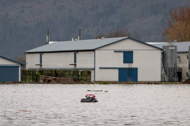 December 11, 2025, Vancouver, Bc, CANADA: A toy vehicle floats through floodwaters near the Sumas border crossing in Abbotsford B.C., on Thursday, December 11, 2025. Vancouver CANADA  - ZUMAc35_ 20251211_zaf_c35_058 Copyright: xEthanxCairnsx