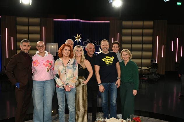 Presenter Micky Beisenherz, l r, stand-up paddler Birgit Burkhardt, handball coach Thomas Floethe and sports journalist Monica Lierhaus, singer Beatrice Egli, emergency counselor Albi Roebke, comedian Mario Barth, national goalkeeper Ann Katrin Berger, and presenter Susan Link as guests on the WDR talk show Kölner Treff