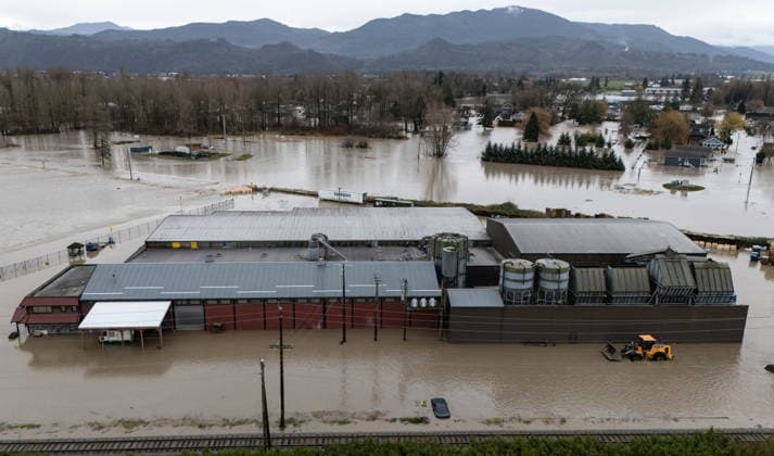 December 11, 2025, Vancouver, Bc, CANADA: Enviro-Corp Recycling is pictured flooded near the Sumas border crossing in Abbotsford B.C., on Thursday, Dec. 11, 2025. Vancouver CANADA  - ZUMAc35_ 20251211_zaf_c35_100 Copyright: xEthanxCairnsx
