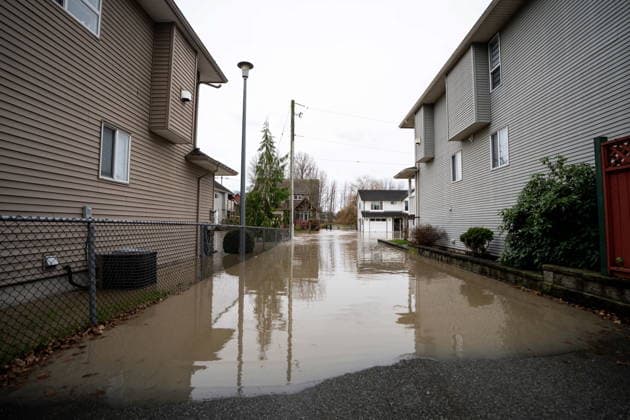 December 11, 2025, Vancouver, Bc, CANADA: Floodwaters surround homes in Abbotsford B.C., on Thursday, December 11, 2025. Vancouver CANADA  - ZUMAc35_ 20251211_zaf_c35_105 Copyright: xEthanxCairnsx