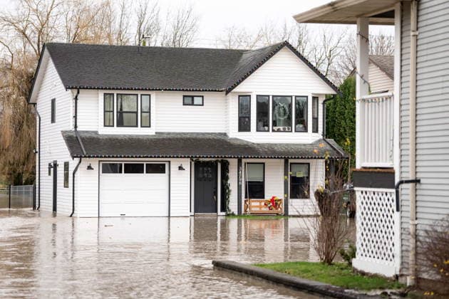 December 11, 2025, Vancouver, Bc, CANADA: Floodwaters surround homes in Abbotsford B.C., on Thursday, December 11, 2025. Vancouver CANADA  - ZUMAc35_ 20251211_zaf_c35_106 Copyright: xEthanxCairnsx