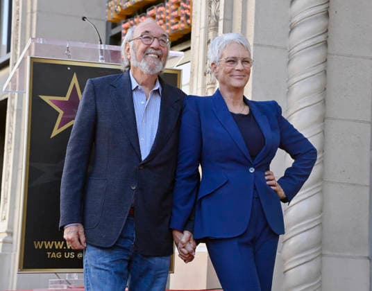 Director, producer and screenwriter James L. Brooks is joined by Jamie Lee Curtis during an unveiling ceremony honoring him with the 2,830th star on the Hollywood Walk of Fame in Los Angeles on Thursday December 11, 2025.  LAP2025121105 JIMxRUYMEN