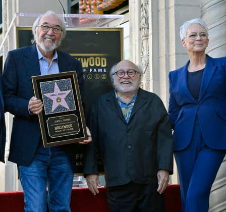 Director, producer and screenwriter James L. Brooks (L) is joined by Danny Devito (C) and Jamie Lee Curtis during an unveiling ceremony honoring him with the 2,830th star on the Hollywood Walk of Fame in Los Angeles on Thursday December 11, 2025.  LAP2025121121 JIMxRUYMEN