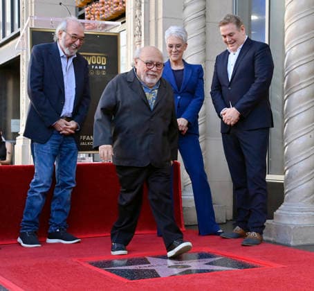Director, producer and screenwriter James L. Brooks (L) is joined by Danny Devito (C) and Jamie Lee Curtis during an unveiling ceremony honoring him with the 2,830th star on the Hollywood Walk of Fame in Los Angeles on Thursday December 11, 2025.  LAP2025121123 JIMxRUYMEN