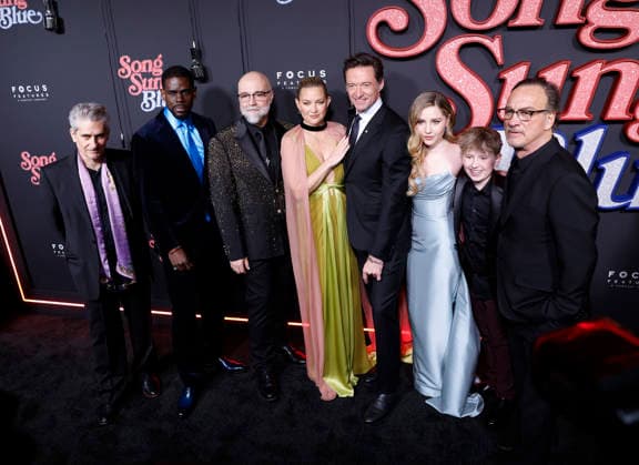 Michael Imperioli, Mustafa Shakir, Craig Brewer, Kate Hudson, Hugh Jackman, Ella Anderson, Hudson Hensley and Jim Belushi arrive on the red carpet at the Focus Features Song Sung Blue New York Premiere at AMC Lincoln Square Theater on Thursday, December 11, 2025 in New York City.  NYP20251211110 JohnxAngelillo