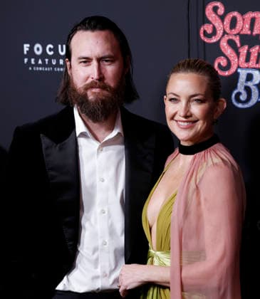 Kate Hudson and Danny Fujikawa arrive on the red carpet at the Focus Features Song Sung Blue New York Premiere at AMC Lincoln Square Theater on Thursday, December 11, 2025 in New York City.  NYP20251211131 JohnxAngelillo