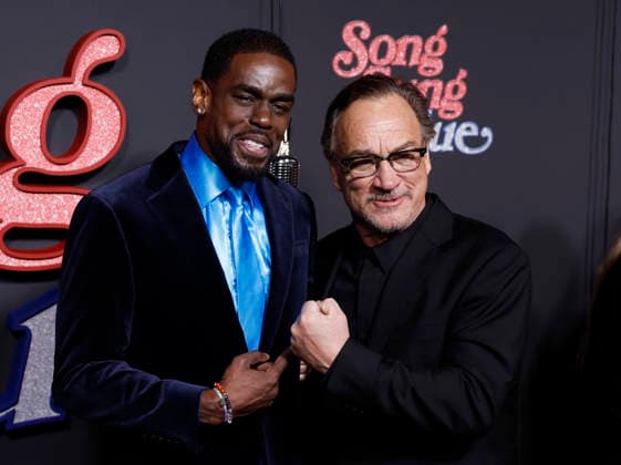 Mustafa Shakir and Jim Belushi arrive on the red carpet at the Focus Features Song Sung Blue New York Premiere at AMC Lincoln Square Theater on Thursday, December 11, 2025 in New York City.  NYP202512111039 JohnxAngelillo