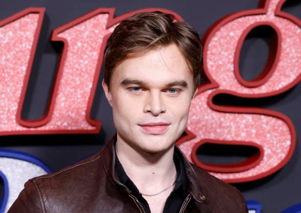 John Beckwith arrives on the red carpet at the Focus Features Song Sung Blue New York Premiere at AMC Lincoln Square Theater on Thursday, December 11, 2025 in New York City.  NYP202512111040 JohnxAngelillo