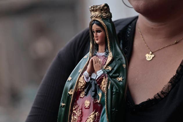 December 11, 2025, Nezahualcoyotl, State Of Mexico, Mexico: Walking with images and statues of the Virgin, pilgrims from ChimalhuacoÂ¡n and Nezahualcoyotl in the State of Mexico are heading to celebrate the Virgin of Guadalupe s birthday at the Basilica on Tepeyac Hill. Hundreds of people, alone or in groups, walk along the railroad tracks that cross past the Neza-Bordo Prison and what was once the largest garbage dump in Latin America. During the six- to eight-hour walk, some people give food as thanks for a miracle they believe the Virgin of Guadalupe has granted them; they also help the pilgrims reach their destination safely. Nezahualcoyotl Mexico - ZUMAp204 20251211_zip_p204_069 Copyright: xJosuexPerezx