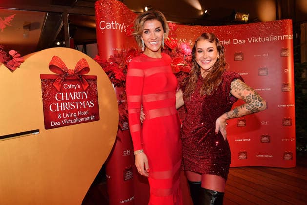Anna Maria Zimmermann and Tiger Kichharz at Cathy s Charity Christmas Event at the Living Hotel Das Viktualienmarkt on 11 12 2025 in Munich Cathy Hummels Charity Christmas Event in Munich