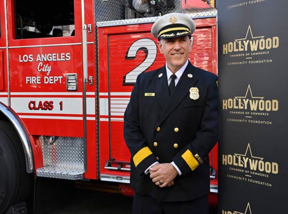 LAFD Chief Jaime E. Moore participates in an unveiling ceremony honoring the Los Angeles Fire Department with an Award of Excellence star adjacent to the Hollywood Walk of Fame in Los Angeles on Tuesday, December 2, 2025. Eniola Taiwo, 14, wrote a letter to the Hollywood Chamber of Commerce suggesting that firefighters who battled the deadly January fires were worthy of a star on the Hollywood Walk of Fame.  LAP2025121224 JIMxRUYMEN