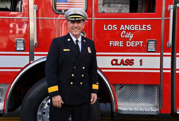 LAFD Chief Jaime E. Moore participates in an unveiling ceremony honoring the Los Angeles Fire Department with an Award of Excellence star adjacent to the Hollywood Walk of Fame in Los Angeles on Tuesday, December 2, 2025. Eniola Taiwo, 14, wrote a letter to the Hollywood Chamber of Commerce suggesting that firefighters who battled the deadly January fires were worthy of a star on the Hollywood Walk of Fame.  LAP2025121227 JIMxRUYMEN