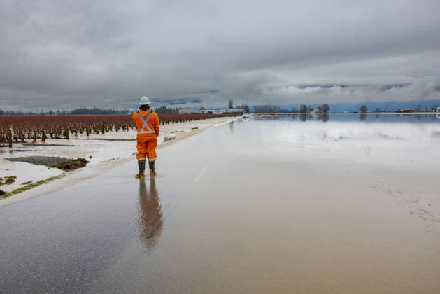 (251213) -- ABBOTSFORD, Dec. 13, 2025 -- This photo provided by the shows a flooded road in Abbotsford, British Columbia, Canada, Dec. 12, 2025. ( Handout via Xinhua) CANADA-ABBOTSFORD-FLOODING GovernmentxofxBritishxColumbia 
