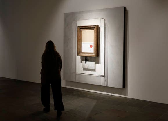 Banksy s Girl without Balloon (2018), the only artwork ever created live in an auction room, is on display at a preview of Icons: Back to Madison at Sotheby s in New York City on Saturday, December 13, 2025. Icons: Back to Madison inaugurates the new global headquarters at the Breuer Building and brings together some of the most iconic works ever sold at Sotheby s.  NYP20251213131 JOHNxANGELILLO
