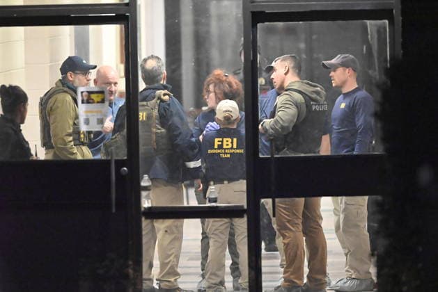 2 killed, 8 critically injured in shooting at Brown University in USk PROVIDENCE, RHODE ISLAND - DECEMBER 13: Members of the FBI Evidence Response Team work at the scene near a body, collect evidence and mark the area with evidence markers at Brown University in Providence, R.I., Saturday, Dec. 13, 2025, during a mass shooting that at least killed two people and wounded eight others. Kyle Mazza Anadolu Rhode Island United States. Editorial use only. Please get in touch for any other usage.  Copyright: x2025xAnadoluxKylexMazzax
