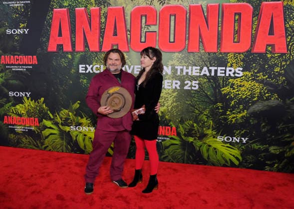 Cast member Jack Black and his wife Tanya Haden attend the world premiere of the motion picture horror comedy Anaconda at the United Theater in Los Angeles on Saturday, December 13, 2025. Storyline: A group of friends are going through a mid-life crisis. They decide to remake a favorite movie from their youth but encounter unexpected events when they enter the jungle.  LAP2025121320 JIMxRUYMEN