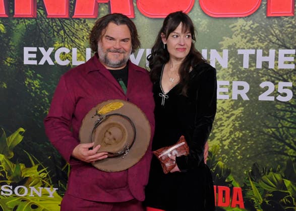 Cast member Jack Black and his wife Tanya Haden attend the world premiere of the motion picture horror comedy Anaconda at the United Theater in Los Angeles on Saturday, December 13, 2025. Storyline: A group of friends are going through a mid-life crisis. They decide to remake a favorite movie from their youth but encounter unexpected events when they enter the jungle.  LAP2025121321 JIMxRUYMEN