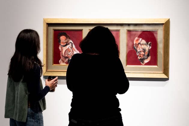 Sotheby s Icons and Bing Crosby Exhibitions press preview Visitors examine Francis Bacon Three Studies for Portrait of Lucian Freud sold for almost 4 million dollars on view during press preview at Sotheby s Icons and Bing Crosby Exhibitions in New York, NY on December 13, 2025. New York New York United States Copyright: LevxRadin