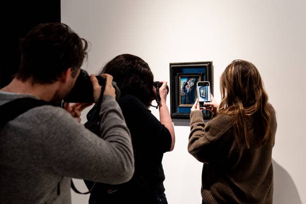 Sotheby s Icons and Bing Crosby Exhibitions press preview Visitors take photos of Salvador Dali Gradiva sold for more than 3 million dollars on view during press preview at Sotheby s Icons and Bing Crosby Exhibitions in New York, NY on December 13, 2025. New York New York United States Copyright: LevxRadin