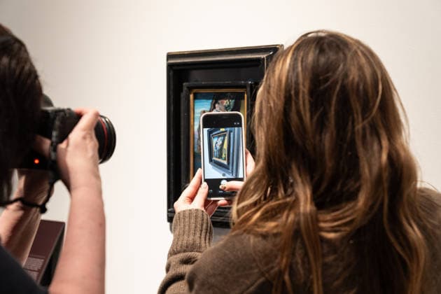 Sotheby s Icons and Bing Crosby Exhibitions press preview Visitors take photos of Salvador Dali Gradiva sold for more than 3 million dollars on view during press preview at Sotheby s Icons and Bing Crosby Exhibitions in New York, NY on December 13, 2025. New York New York United States Copyright: LevxRadin