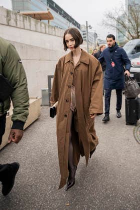 Emily in Paris cast - Paris Lily Collins arrives at Gare d’Austerlitz by the Orient Express in Paris, on December 14, 2025. Photo by Eliot Blondet ABACAPRES.COM Paris France France  Copyright: xBlondetxEliot ABACAx