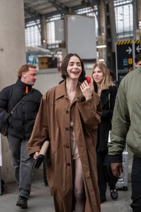 Emily in Paris cast - Paris Lily Collins arrives at Gare d’Austerlitz by the Orient Express in Paris, on December 14, 2025. Photo by Eliot Blondet ABACAPRES.COM Paris France France  Copyright: xBlondetxEliot ABACAx