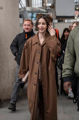 Emily in Paris cast - Paris Lily Collins arrives at Gare d’Austerlitz by the Orient Express in Paris, on December 14, 2025. Photo by Eliot Blondet ABACAPRES.COM Paris France France  Copyright: xBlondetxEliot ABACAx