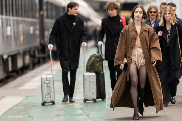 Emily in Paris cast - Paris Lily Collins arrives at Gare d’Austerlitz by the Orient Express in Paris, on December 14, 2025. Photo by Eliot Blondet ABACAPRES.COM Paris France France  Copyright: xBlondetxEliot ABACAx
