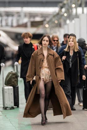 Emily in Paris cast - Paris Lily Collins arrives at Gare d’Austerlitz by the Orient Express in Paris, on December 14, 2025. Photo by Eliot Blondet ABACAPRES.COM Paris France France  Copyright: xBlondetxEliot ABACAx