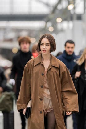 Emily in Paris cast - Paris Lily Collins arrives at Gare d’Austerlitz by the Orient Express in Paris, on December 14, 2025. Photo by Eliot Blondet ABACAPRES.COM Paris France France  Copyright: xBlondetxEliot ABACAx