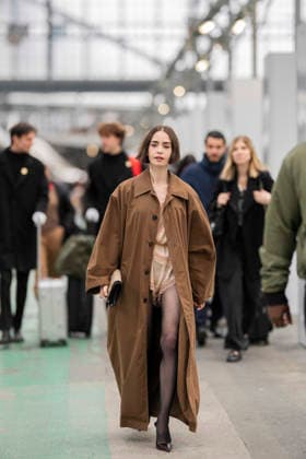 Emily in Paris cast - Paris Lily Collins arrives at Gare d’Austerlitz by the Orient Express in Paris, on December 14, 2025. Photo by Eliot Blondet ABACAPRES.COM Paris France France  Copyright: xBlondetxEliot ABACAx
