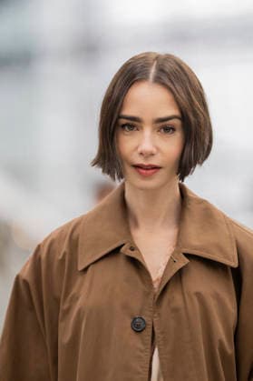 Emily in Paris cast - Paris Lily Collins arrives at Gare d’Austerlitz by the Orient Express in Paris, on December 14, 2025. Photo by Eliot Blondet ABACAPRES.COM Paris France France  Copyright: xBlondetxEliot ABACAx