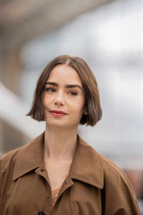 Emily in Paris cast - Paris Lily Collins arrives at Gare d’Austerlitz by the Orient Express in Paris, on December 14, 2025. Photo by Eliot Blondet ABACAPRES.COM Paris France France  Copyright: xBlondetxEliot ABACAx
