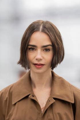 Emily in Paris cast - Paris Lily Collins arrives at Gare d’Austerlitz by the Orient Express in Paris, on December 14, 2025. Photo by Eliot Blondet ABACAPRES.COM Paris France France  Copyright: xBlondetxEliot ABACAx