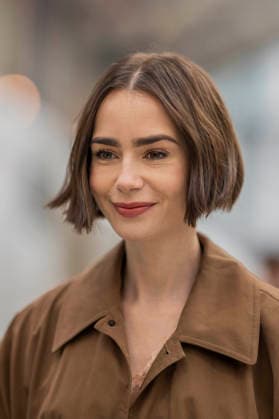 Emily in Paris cast - Paris Lily Collins arrives at Gare d’Austerlitz by the Orient Express in Paris, on December 14, 2025. Photo by Eliot Blondet ABACAPRES.COM Paris France France  Copyright: xBlondetxEliot ABACAx
