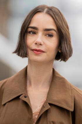 Emily in Paris cast - Paris Lily Collins arrives at Gare d’Austerlitz by the Orient Express in Paris, on December 14, 2025. Photo by Eliot Blondet ABACAPRES.COM Paris France France  Copyright: xBlondetxEliot ABACAx