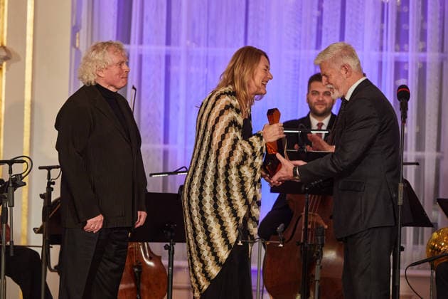 Mezzo-soprano Magdalena Kozena and her husband, British conductor Simon Rattle (left), received the Antonin Dvorak Award for 2025 from President Petr Pavel (right) in the Spanish Hall of Prague Castle, in Prague, on December 14, 2025. (CTKxPhoto DorotaxHolubova) CTKPhotoP2025121406652  CTKPhotoP2025121406652