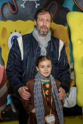 ABBberlin Frida Korittke and Oliver Korittke father and daughter as guests on the yellow carpet at the German premiere of SPONGEBOB SCHWAMMKOPF PIRATEN AHOI at the cinema in the Kulturbrauerei on 14 12 2025 Berlin Germany