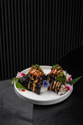 IMAGO Creative, Food, Japan, Onigiri Onigiri with fish filling, drizzled with sauce Warsaw, Masovian Voivodeship, Poland R_ORVG251214-1899144-01