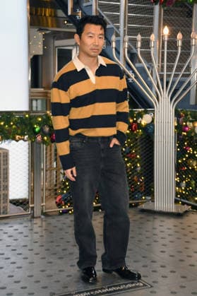 NEW YORK, NY- DECEMBER 15: Simu Liu pictured as the cast of Peacock™s upcoming espionage thriller series, The Copenhagen Test visit the Empire State Building Observatory ahead of it™s December 27th premiere in New York City on December 15, 2025. Copyright: xMediaPunchx