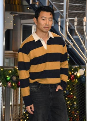 NEW YORK, NY- DECEMBER 15: Simu Liu pictured as the cast of Peacock™s upcoming espionage thriller series, The Copenhagen Test visit the Empire State Building Observatory ahead of it™s December 27th premiere in New York City on December 15, 2025. Copyright: xMediaPunchx
