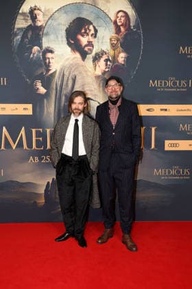 Tom Payne and director Philipp Stoelzl at the cinema premiere of The Medicus 2 on 15 12 2025 in Cologne The Medicus 2 cinema premiere in Cologne