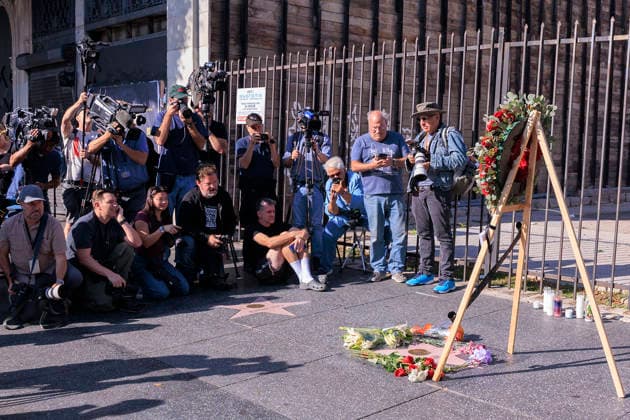 December 15, 2025, Hollywood, California, USA: Media gather around a wreath of flowers placed on director actor Rob Reiner s Star on the Hollywood Walk of Fame on Monday December 15, 2025 in Hollywood, California. The LAPD confirmed that Rob Reiner and his wife Michele Singer Reiner were found dead in their Brentwood home. Their son Nick has been arrested in connection to their deaths. JAVIER ROJAS PI Hollywood USA - ZUMAp124 20251215_zaa_p124_028 Copyright: xJavierxRojasx