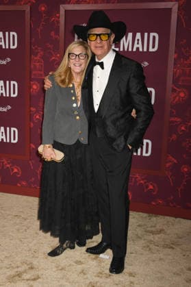 HOLLYWOOD, CA - DECEMBER 15: Laurie Feig and Paul Feig at the Los Angeles premiere of The Housemaid on December 15, 2025 at the TCL Chinese Theater in Hollywood, California. Copyright: xJeffreyxMayerx