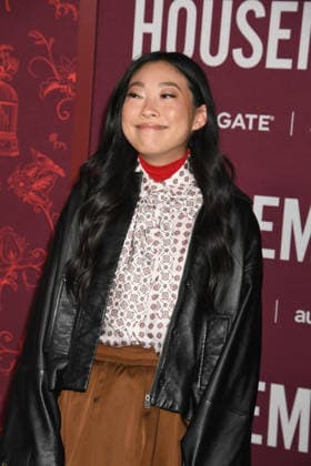 HOLLYWOOD, CA - DECEMBER 15: Awkwafina at the Los Angeles premiere of The Housemaid on December 15, 2025 at the TCL Chinese Theater in Hollywood, California. Copyright: xJeffreyxMayerx