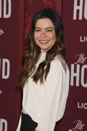 HOLLYWOOD, CA - DECEMBER 15: Miranda Cosgrove at the Los Angeles premiere of The Housemaid on December 15, 2025 at the TCL Chinese Theater in Hollywood, California. Copyright: xJeffreyxMayerx