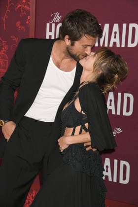 HOLLYWOOD, CA - DECEMBER 15: Brandon Sklenar and Courtney Salviolo at the Los Angeles premiere of The Housemaid on December 15, 2025 at the TCL Chinese Theater in Hollywood, California. Copyright: xJeffreyxMayerx