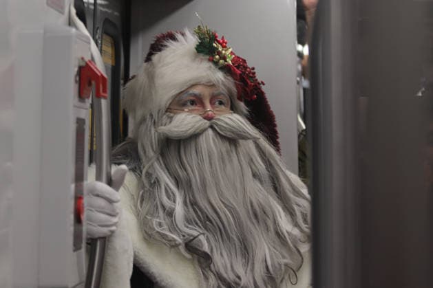 Joso Miguel Moctezuma characterized as Santa Claus iluminated, traveling at the Mexico City s Metro line 1 to greet and take photos with the people. on December 15, 2025 in Mexico City, Mexico. Mexico City Mexico - ZUMAe321 20251215_zia_e321_013 Copyright: xCarlosxSantiagox